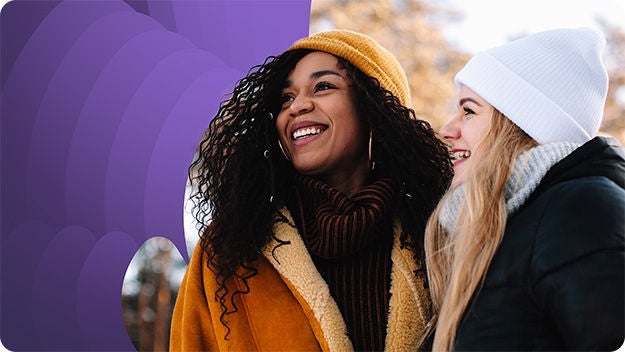 Two persons looking at smiling.