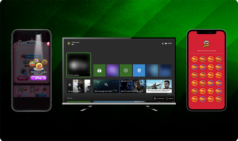 Three screens on a green background: a smartphone on the left showing a Candy Crush game with a “Play” button, a TV in the center displaying the Xbox home interface with colorful tiles, and a smartphone on the right featuring a Pringles-themed match-3 game on a red screen.