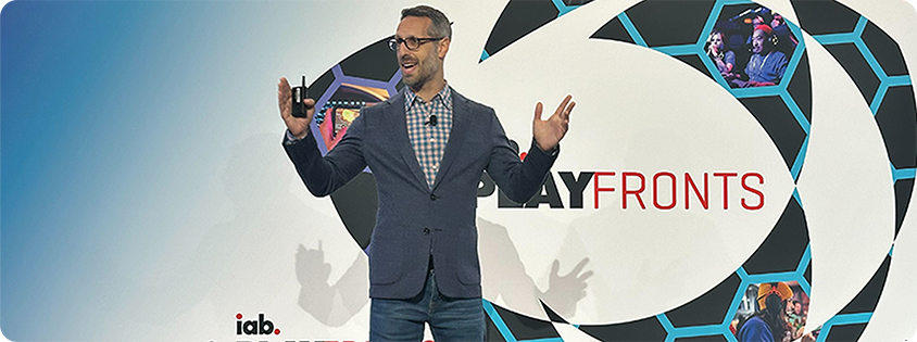 Jordan Shlachter speaks on stage at PlayFronts 2025