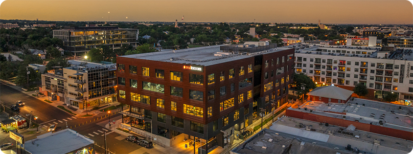 headquarters building at dusk viewed from above.